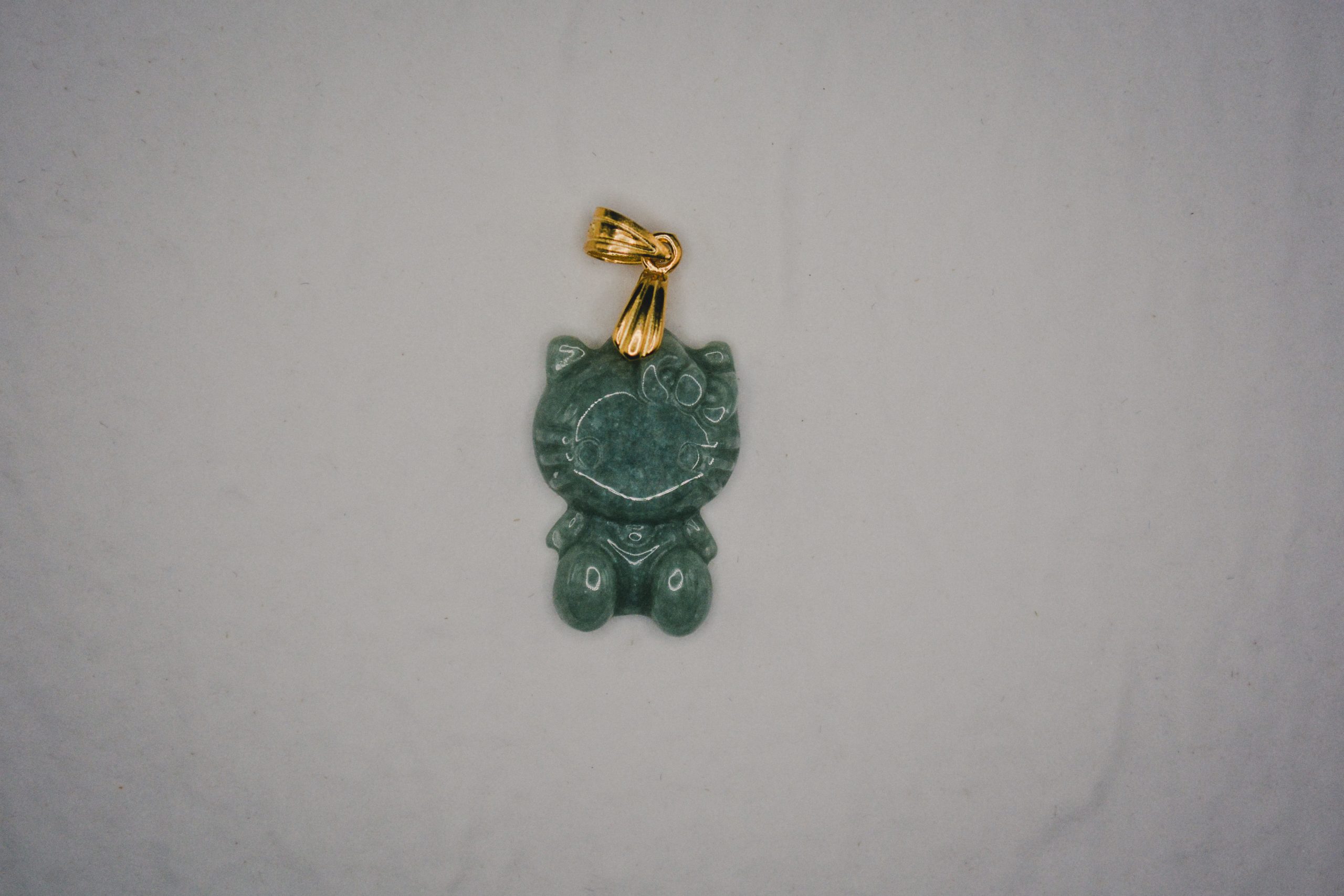 hello kitty pendant in green jade