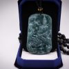 kuan yin goddess of mercy rides a dragon in green guatemalan jade