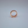 rose gold colored modular ring with shiny metallic inner band