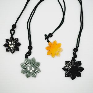 filipino sun black jadeite pendant