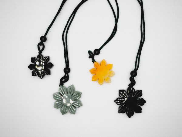 filipino sun black jadeite pendant